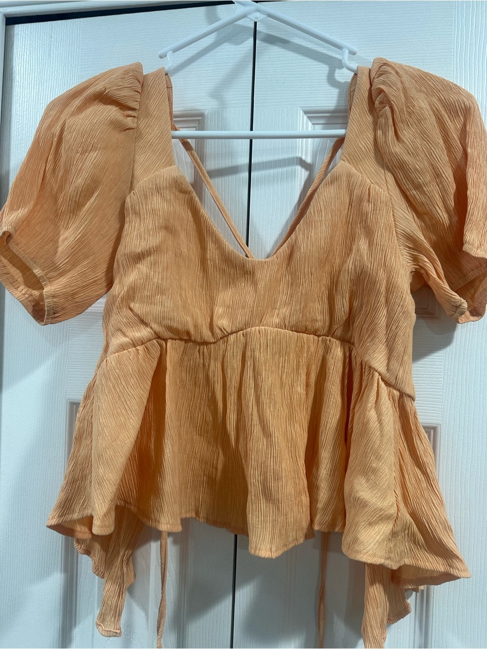 Women’s Puff Sleeve Peplum Top in Light Orange
